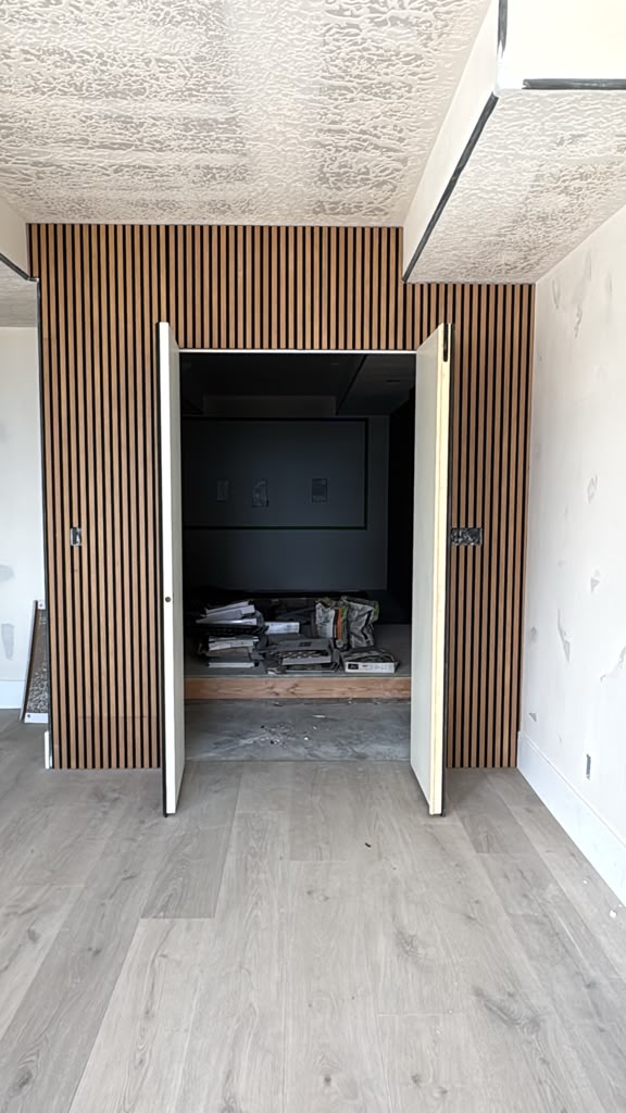 Concealed access built into acoustic wall